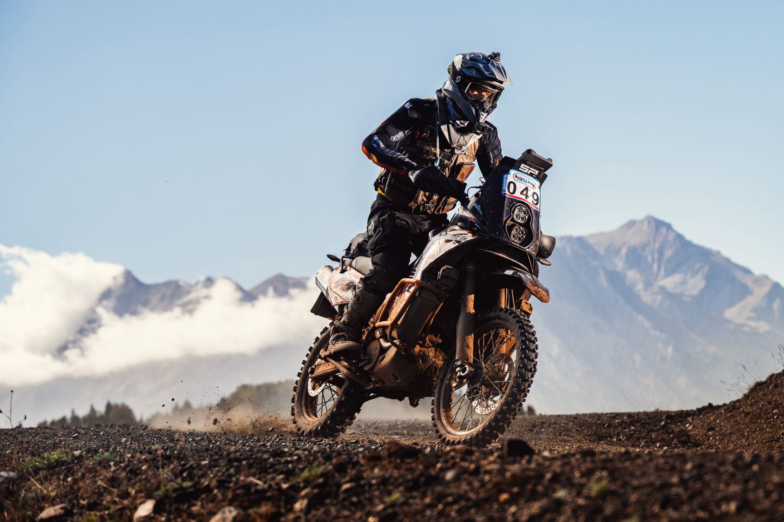 KTM adventure motorcycle with custom LED headlight by 3Dit in workshop garage setting